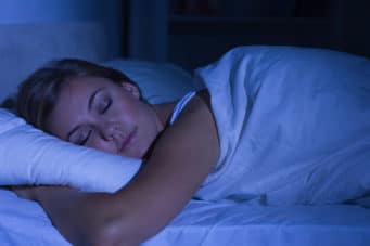 Woman getting restful sleep after getting her insomnia treated