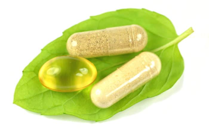 photo of herbal supplements on leaf