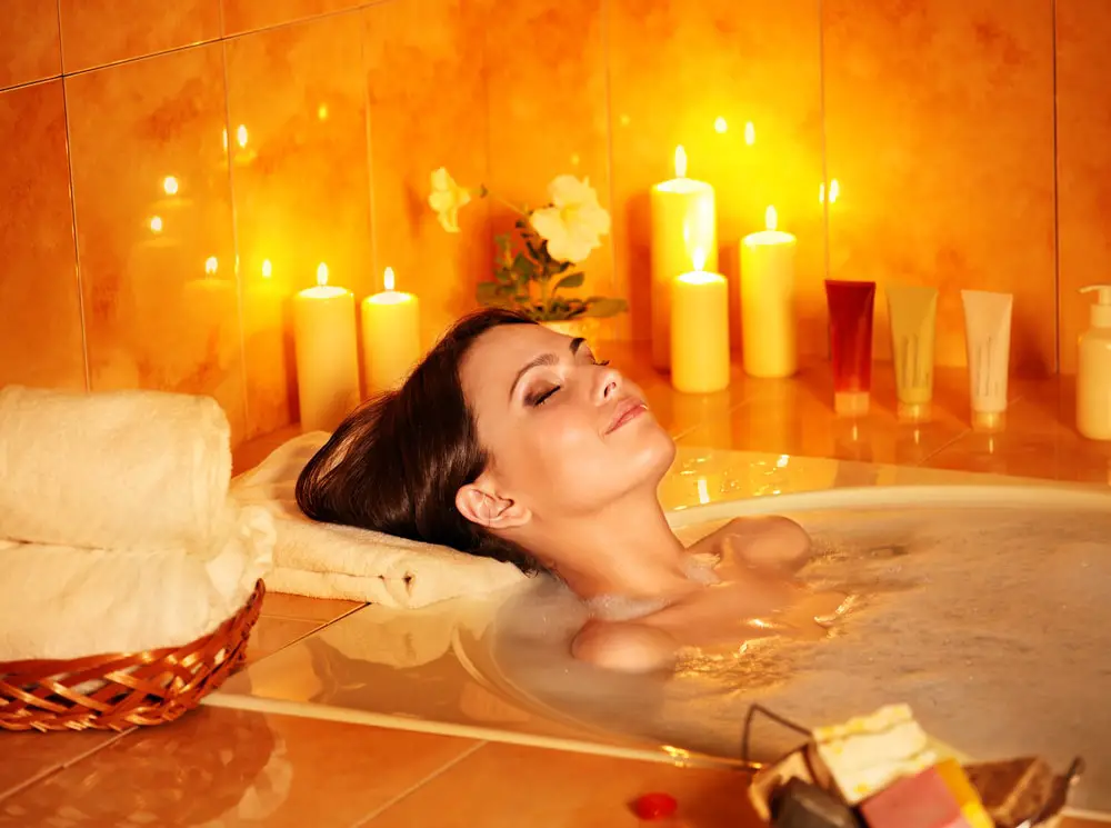 photo of lady taking a bath to relax instead of doing a puzzle before bed