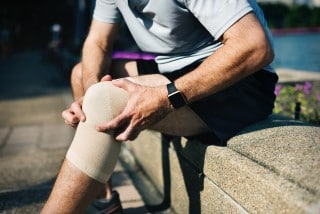 Chronic pain issues such as arthritic knees can really be a nuisance at night picture of man with chronic pain in knee