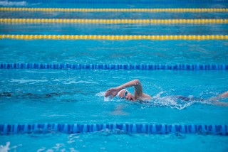 picture of person swimming in pool for pain management