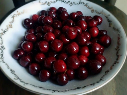 pile of dark cherries which are a replacement for the foods to avoid when having insomnia