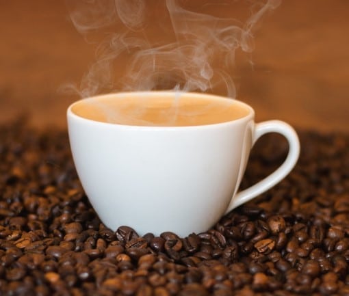 coffee steaming in a cup that can lead to worries about obstructive sleep apnea and caffeine