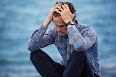 photo of man worried about strained marriage which is another way sleep apnea is bad