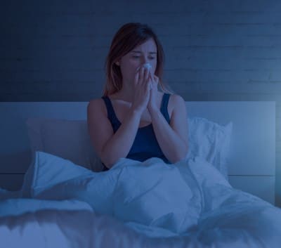 Blowing your nose too much is one of the things besides snoring that can cause nose bleeds lady in bed wondering whether snoring is causing her nose bleeds