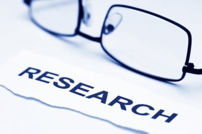 photo of glasses next to the word research