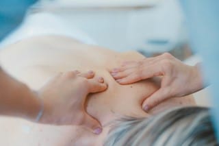 photo showing person getting a relaxing massage to help insomnia