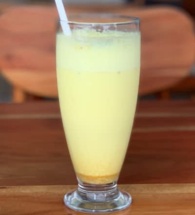 picture of fruit smoothie yellow from turmeric