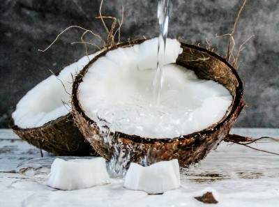 photo of sliced coconuts which has nutrients which can help keep from falling asleep at work