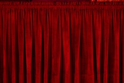 Heavy drapes can help block outside light red heavy drapes covering window