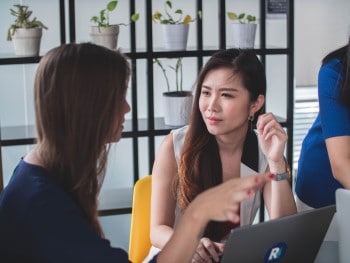 women arguing about politics at work which is keep them awake at night