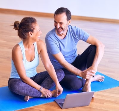 couple stretching before bedtime which can help if CPAP is stressing you out