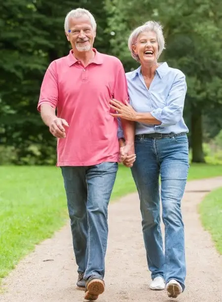 photo showing older couple walking which is something else besides napping that can help arthritis