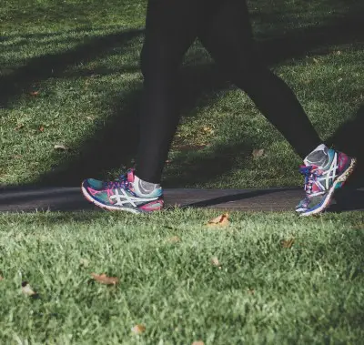 Exercise can help you fall asleep more quickly photo of person walking for exercise