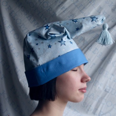 photo of lady wearing night cap