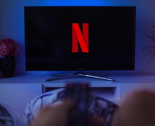 A spouse keeping the TV on at night can strain the best of relationships photo of husband keeping the TV on at night to watch Netflix