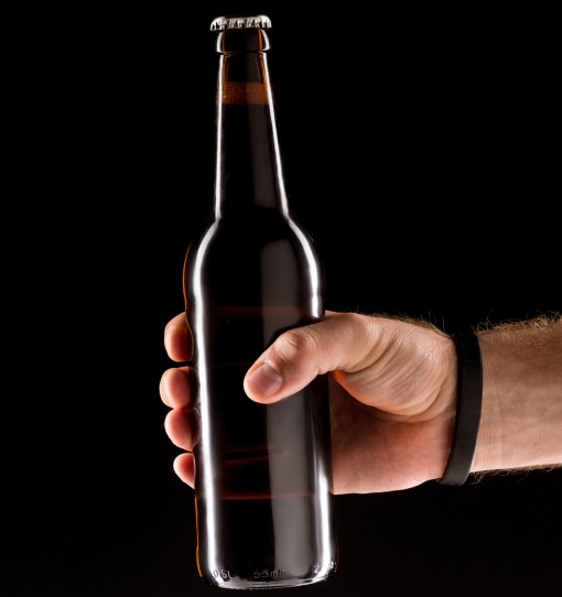 photo of person holding a beer to have before bed