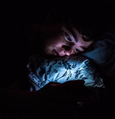 screen light from smart phone at night on bed 400px photo sick female teen in bed