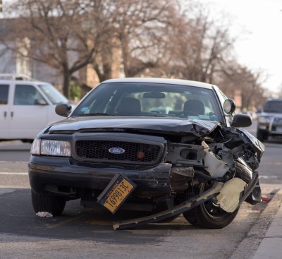 photo of car damaged from accident which is another reason why sleep is NOT a waste of time