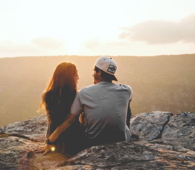 photo of happy couple enjoying nature