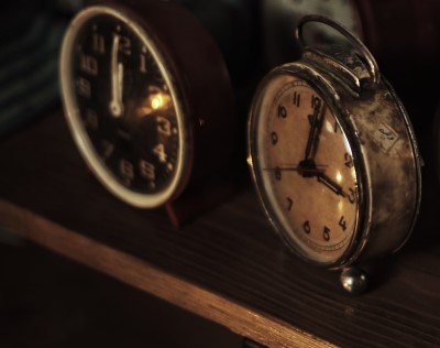 photo of alarm clocks on shelf