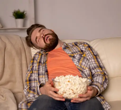What’s more frustrating than when a husband keeps falling asleep? photo of husband keeps falling asleep while watching on the couch to watch a movie