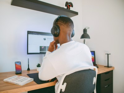 photo of person now working from home since slept through his alarm for work