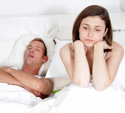 Resentment is sure to build up if a husband keeps falling asleep too early at night photo of wife upset in bed because her husband keeps falling asleep on her