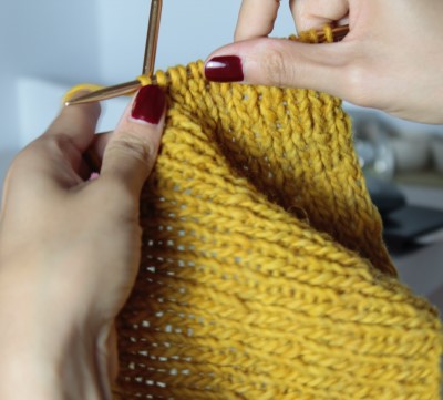  photo of person knitting as a fun thing to do before bed