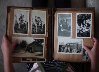  photo of photo album showing family pictures