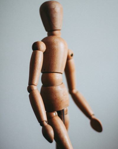 Pay more attention to how you're sitting... photo of a wood stick figure