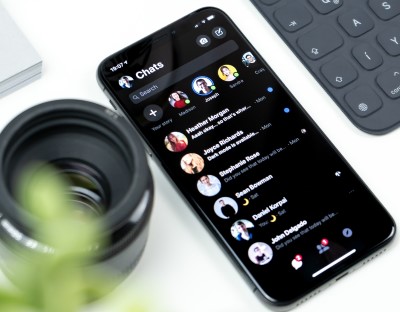 If cell phone light is waking you up at night, give dark mode a try! photo of phone switched to dark mode to keep cell phone light from waking you up at night
