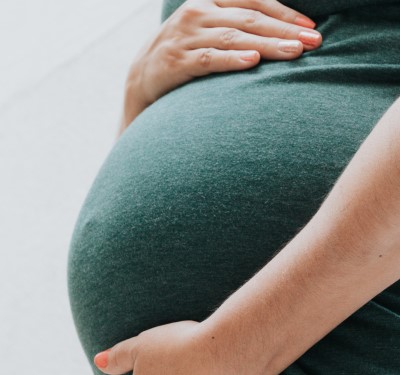 Pregnancy is an acne cause for women using CPAP photo of pregnant mom who uses CPAP and has acne