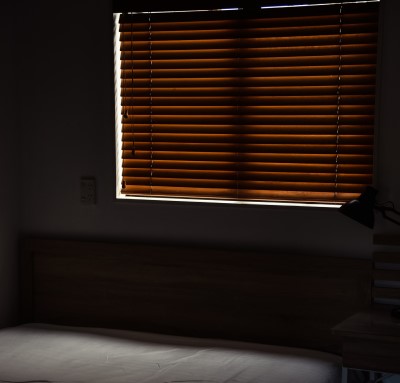 photo of bedroom with shades closed