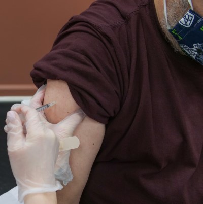 hoto showing CPAP user getting an allergy shot to make his nights easier