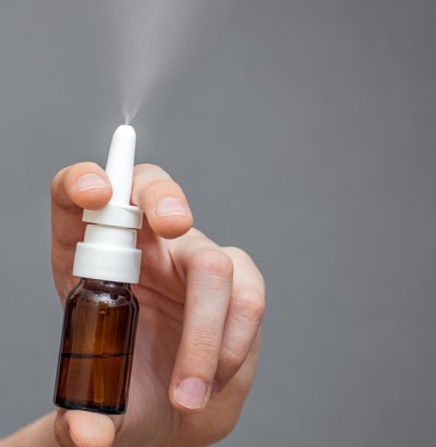 An evening nasal rinse can help keep allergies more manageable photo showing nasal rinse bottle