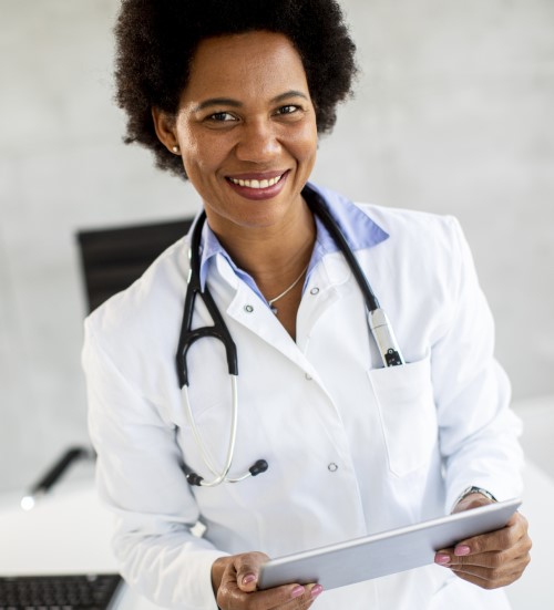 a doctor holding a computer tablet