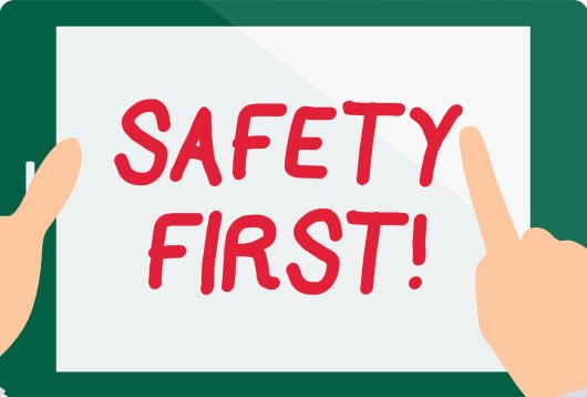 cartoon drawing of sign with the words safety first