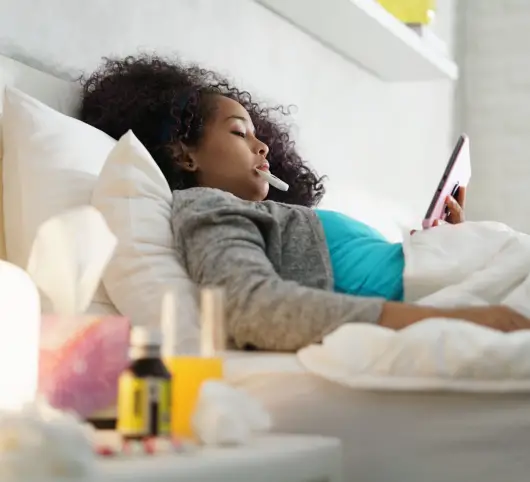 photo sick female teen in bed