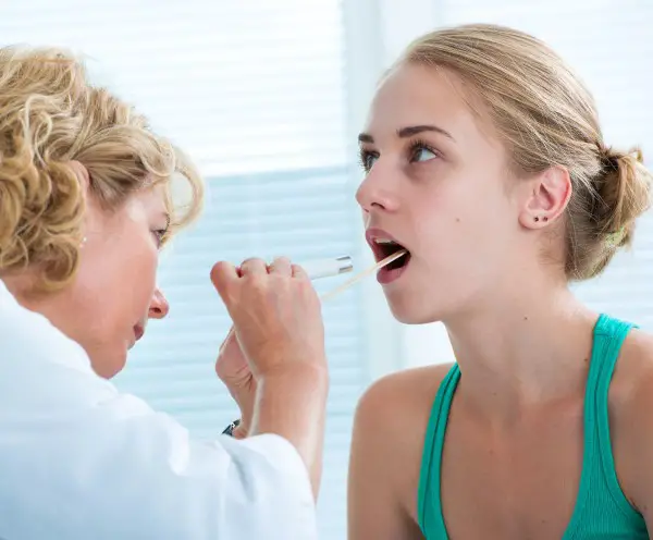 photo of teen getting a check up