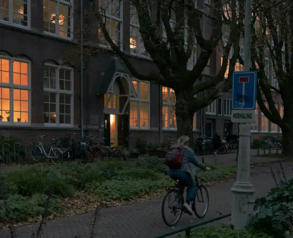 school early morning female teen on bike while dark 600px photo of female teen asleep in bed