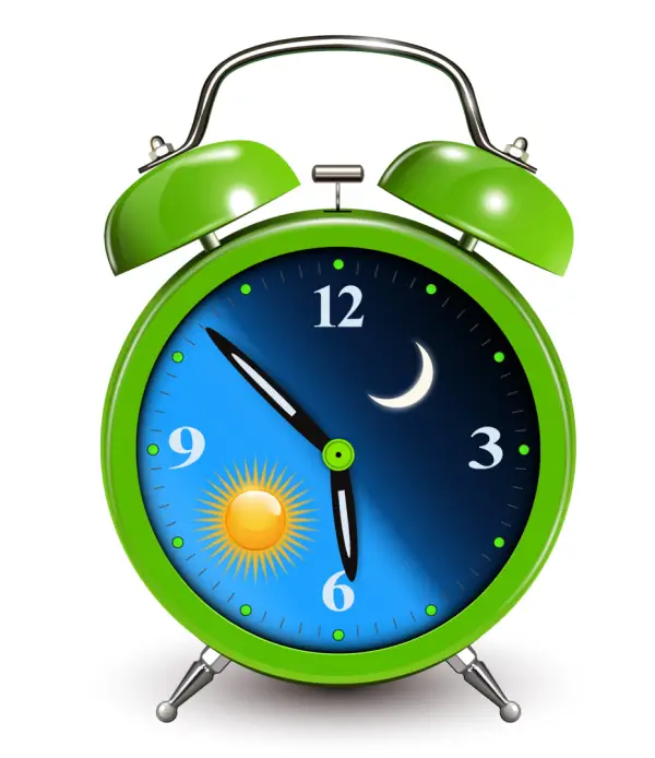 photo of a clock depicting day and night