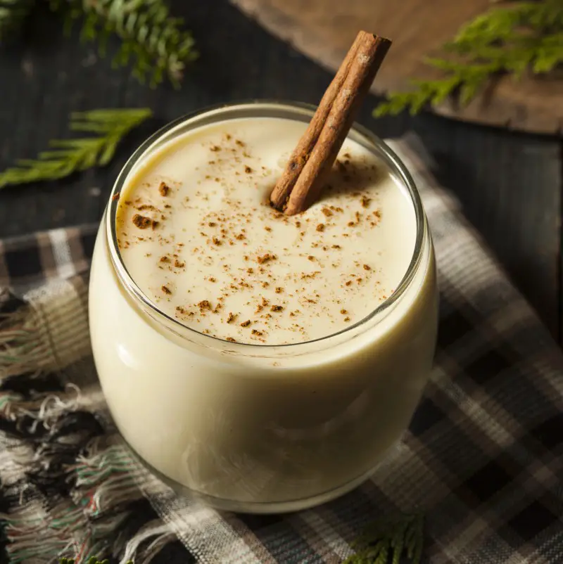 a glass of rich holiday eggnog which can lead to insomnia